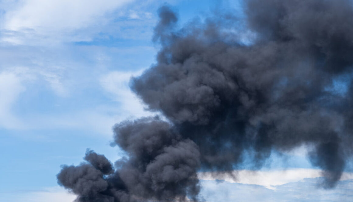 Intense Smoke Rising from Fire
