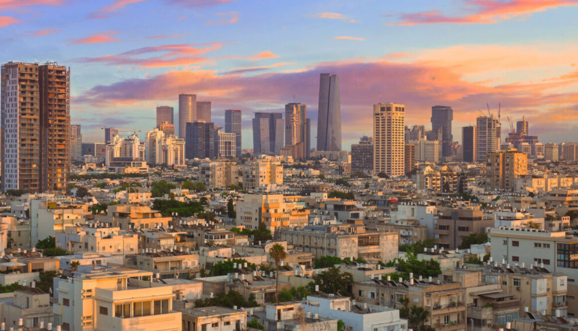 Huge Panorama of Tel Aviv city, with the older Buildings in the foreground, and the modern Skyscrapers in the background. Under a very beautiful Sky.
