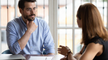 HR manger listening female applicant during job interview