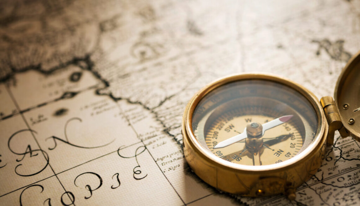 Compass with vintage map