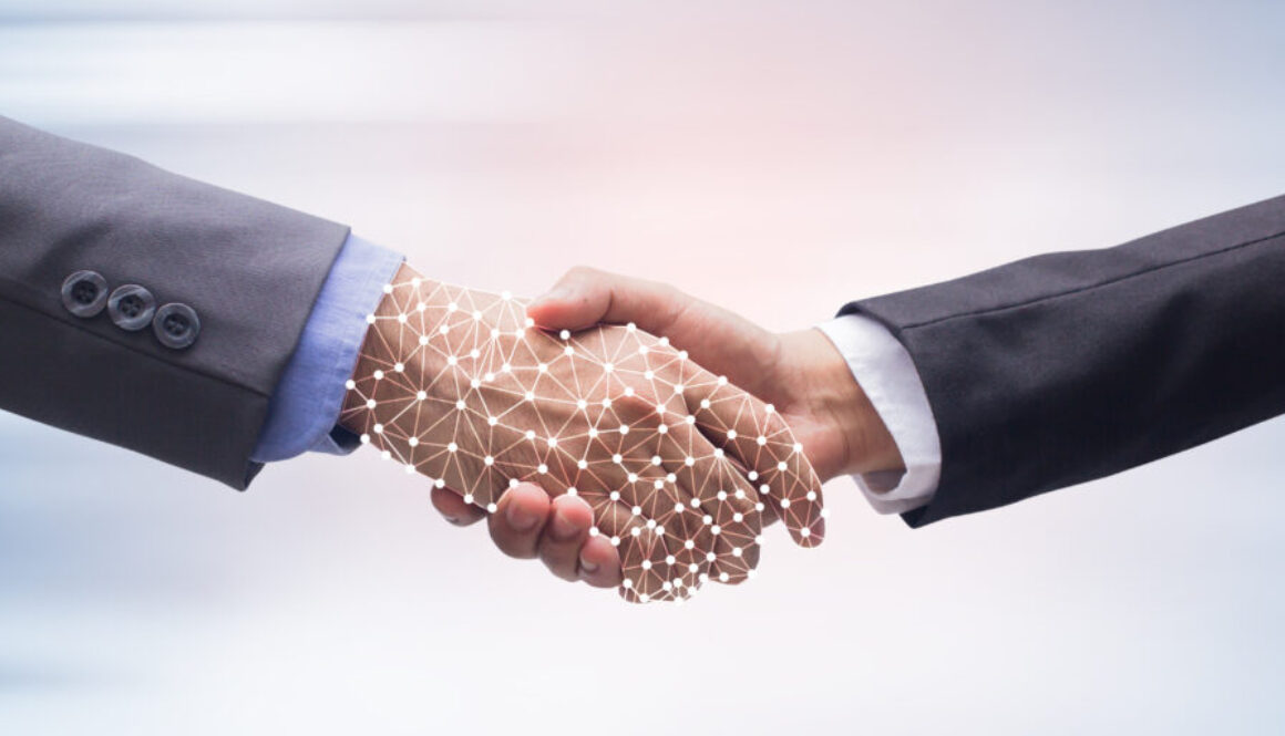 close up business man handshake with business artificial intelligence (AI) on motion blur background for future technology concept